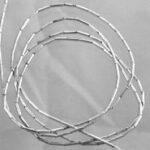 Coiled segmented metal wire