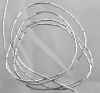 Coiled segmented metal wire