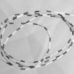 Black and white beaded necklace loops