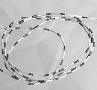 Black and white beaded necklace loops