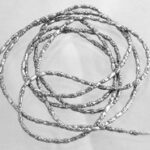 Coiled silver braided wire loops