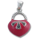 Red heart-shaped pendant with silver bow