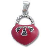 Red heart-shaped pendant with silver bow