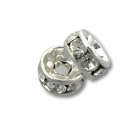 two silver rhinestone spacer beads