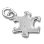 Small silver puzzle piece charm pendant