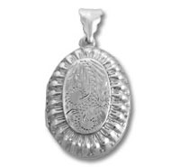 Engraved oval silver pendant with textured rim