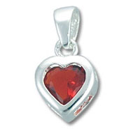 Silver heart pendant with red gemstone