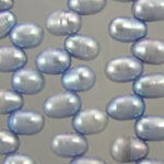 Close-up of pale blue pearl strands