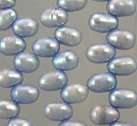 Close-up of pale blue pearl strands