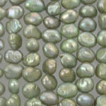 Close-up of iridescent green freshwater pearls