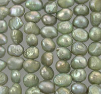 Close-up of iridescent green freshwater pearls