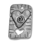 Textured metal pendant with heart cutouts