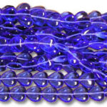 Strands of cobalt blue faceted glass beads