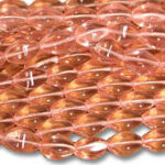 Close-up of translucent pink oval beads