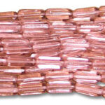Close-up of pink glass bugle beads