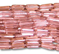 Close-up of pink glass bugle beads