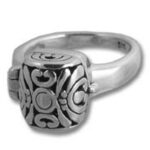 Silver ring with ornate engraved square bezel
