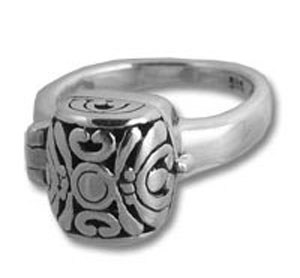 Silver ring with ornate engraved square bezel