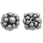 Pair of decorative silver floral spacer beads