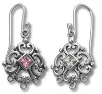 Pair of ornate silver filigree earrings with gemstones