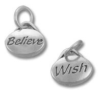 Two silver "Believe" and "Wish" charms