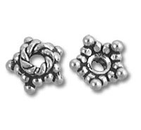 Two silver decorative spacer beads