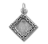 Silver diamond-shaped pendant with filigree border