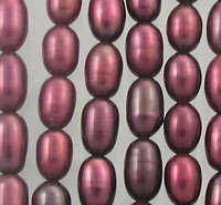 Rows of metallic mauve oval beads