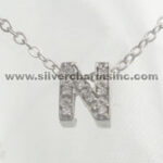 Silver diamond-studded letter N necklace