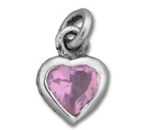 silver heart pendant with pink gemstone