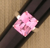 Silver ring with large pink rectangular gemstone