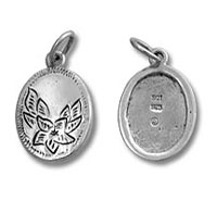 Two oval silver pendants showing front and back