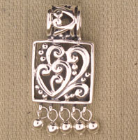 Silver filigree heart pendant with dangling beads