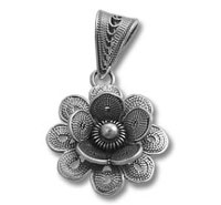 Ornate silver floral pendant