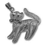 Ornate silver cat pendant with filigree