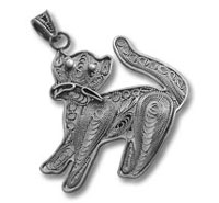Ornate silver cat pendant with filigree