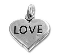Silver heart pendant engraved with LOVE