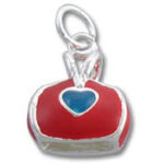 Silver-trimmed red charm with blue heart