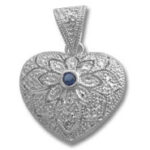 Silver filigree heart pendant with blue stone