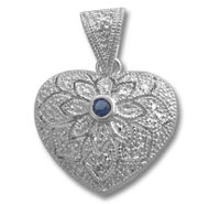 Silver filigree heart pendant with blue stone