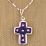 Purple cross pendant with white stars