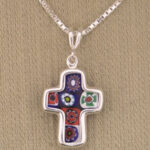 Silver cross pendant with colorful millefiori inlay