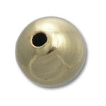 Shiny gold jewelry bead with drilled hole