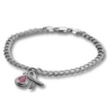 Silver chain bracelet with pink teardrop charm