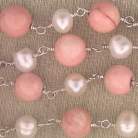 Pink coral and pearl beaded necklace