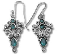 Silver filigree earrings with teal teardrop stones