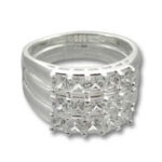 Silver diamond cluster ring on white background