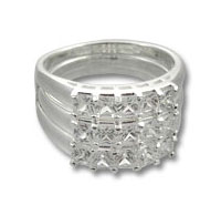 Silver diamond cluster ring on white background