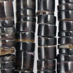 Close-up of black tube bead strands