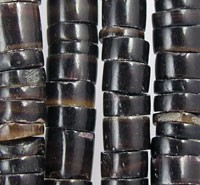 Close-up of black tube bead strands